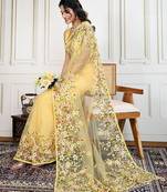 Yellow embroidered work saree with blouse piece