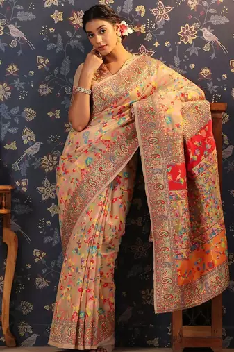 Cream woven design banarasi saree with blouse piece
