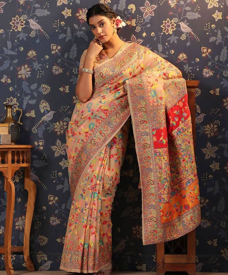 Cream woven design banarasi saree with blouse piece