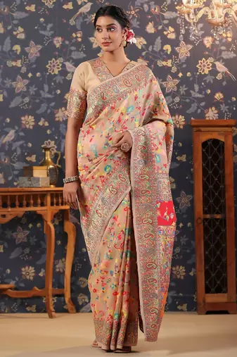 Cream woven design banarasi saree with blouse piece