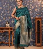 Green ethnic motifs woven-design banarasi saree with blouse