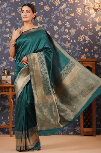 Green ethnic motifs woven-design banarasi saree with blouse
