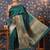 Green ethnic motifs woven-design banarasi saree with blouse