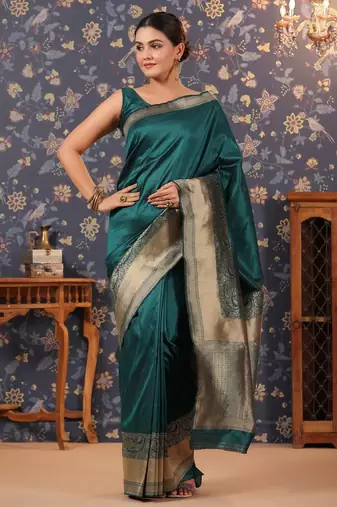 Green ethnic motifs woven-design banarasi saree with blouse