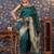 Green ethnic motifs woven-design banarasi saree with blouse