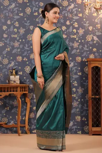 Green ethnic motifs woven-design banarasi saree with blouse