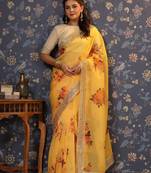 Yellow floral printed sequinned organza saree