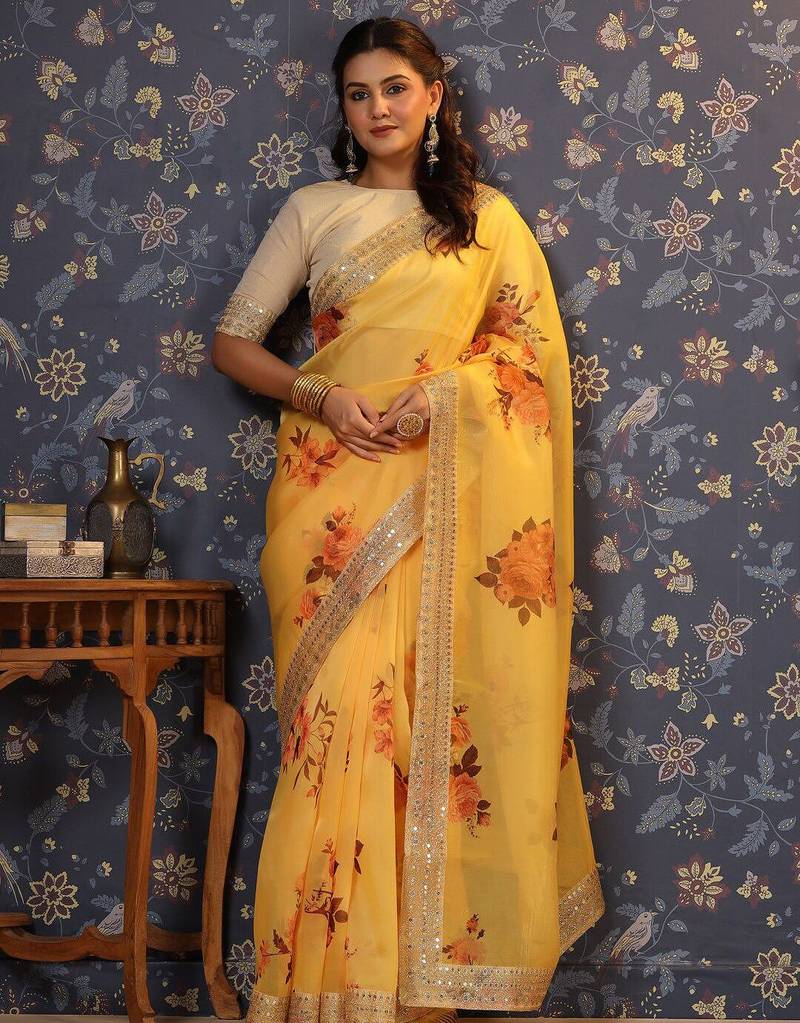 Yellow floral printed sequinned organza saree