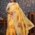 Yellow floral printed sequinned organza saree