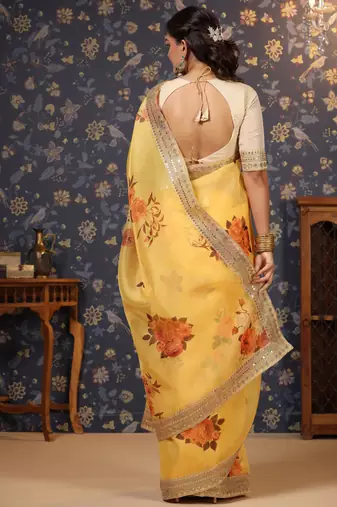 Yellow floral printed sequinned organza saree