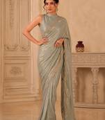 Sea green ethnic motifs beads and stones satin designer saree