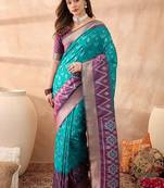 Turquoise woven design ikat sarees