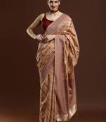 Beige woven design saree with blouse
