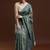 Green woven design saree with blouse