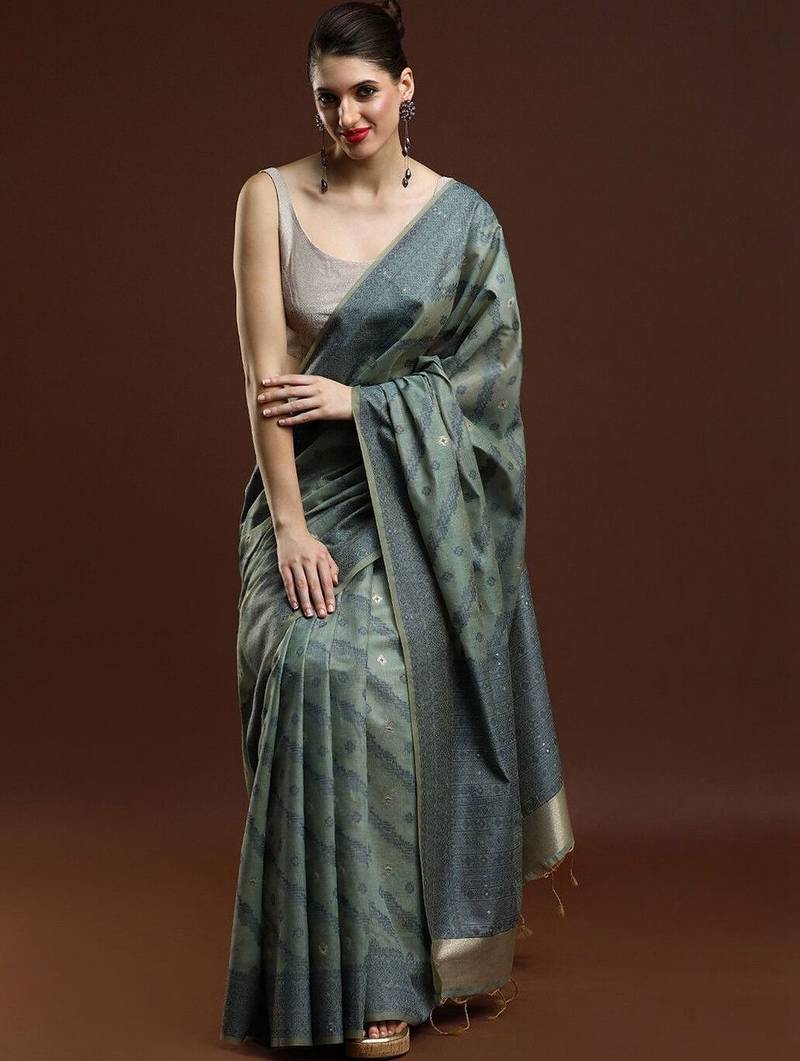 Green woven design saree with blouse