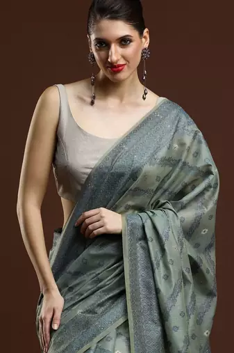 Green woven design saree with blouse