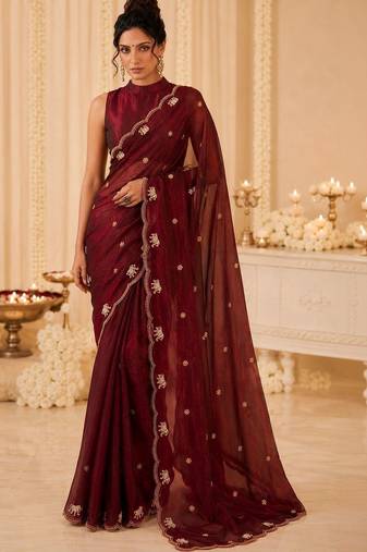 Maroon ethnic motifs beads and stones satin saree