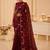 Maroon ethnic motifs beads and stones satin saree
