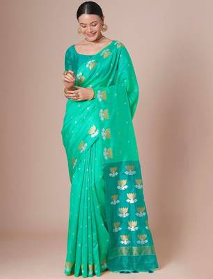 Turquoise woven design festive saree with matching blouse 1
