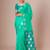 Turquoise woven design festive saree with matching blouse