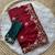 Maroon ethnic motifs embroidered pure georgette saree