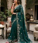 Teal ethnic motifs zari pure georgette saree