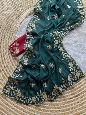 Teal ethnic motifs zari pure georgette saree 4