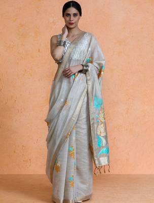 Beige woven design muga sarees with blouse piece 1