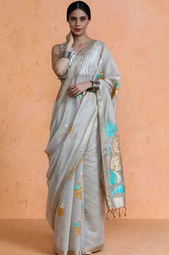 Beige woven design muga sarees with blouse piece