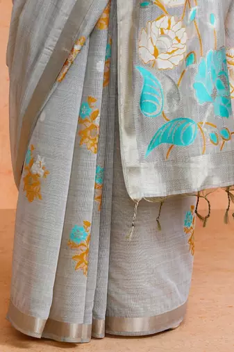 Beige woven design muga sarees with blouse piece