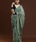 Green woven design muga sarees with blouse piece