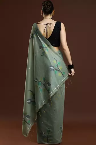Green woven design muga sarees with blouse piece