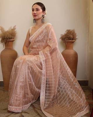 Cream ethnic sequence embroidered saree 1
