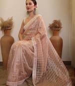 Cream ethnic sequence embroidered saree