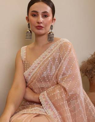Cream ethnic sequence embroidered saree 5