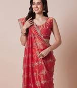 Orange embroidered party wear saree with unstitched blouse piece