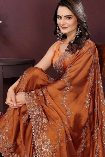 Rust floral embroidered sequinned saree with unstitched blouse