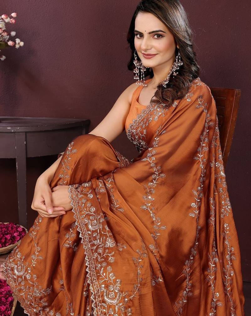 Rust floral embroidered sequinned saree with unstitched blouse