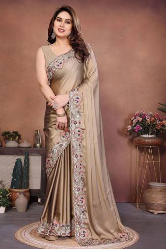 Beige embroidered saree with unstitched blouse