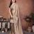 Beige embroidered saree with unstitched blouse
