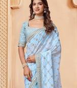 Turquoise embroidered embellished sarees