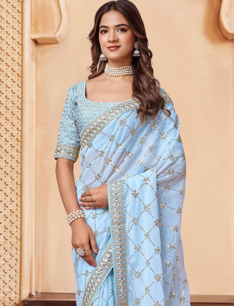 Turquoise embroidered embellished sarees