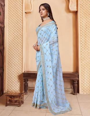 Turquoise embroidered embellished sarees 3
