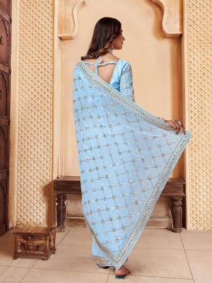 Turquoise embroidered embellished sarees 4