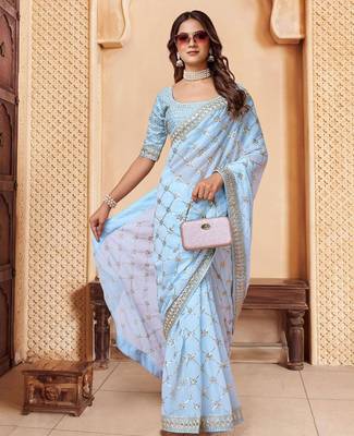 Turquoise embroidered embellished sarees 5
