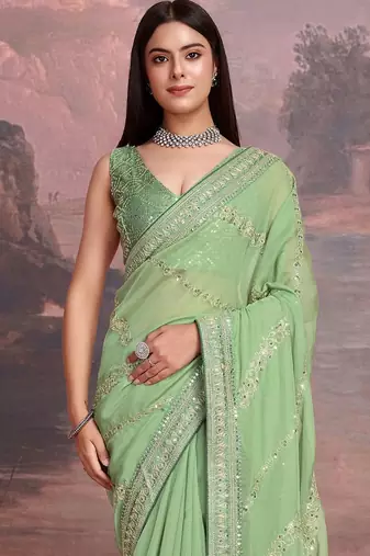 Green embroidered saree with blouse