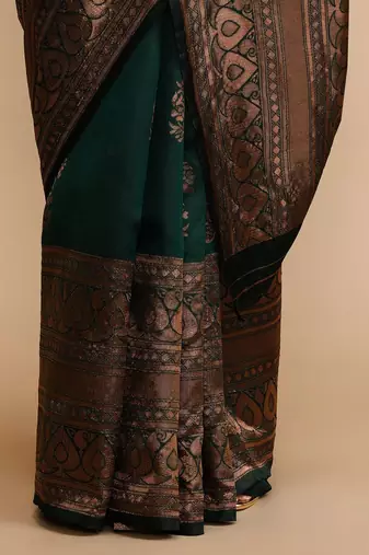 Green woven design banarasi sarees