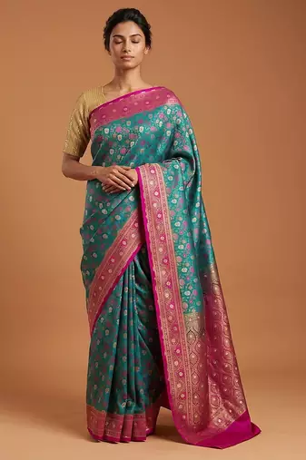 Green satin woven saree with blouse