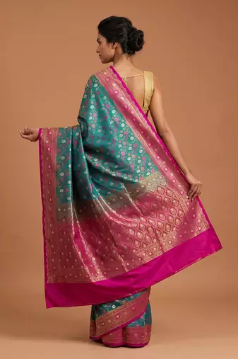 Green satin woven saree with blouse