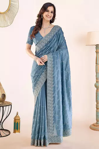 Blue embroidered festive wear saree with matching blouse